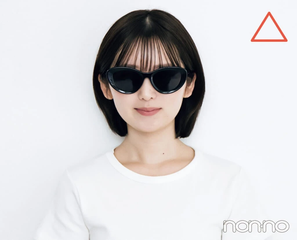 丸顔さんがキャットアイフレームのサングラスをかけたカット