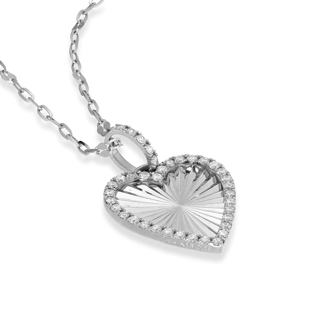 スタージュエリーのCLEAR ETCHED HEARTK18WG ダイヤモンドチャーム¥198000