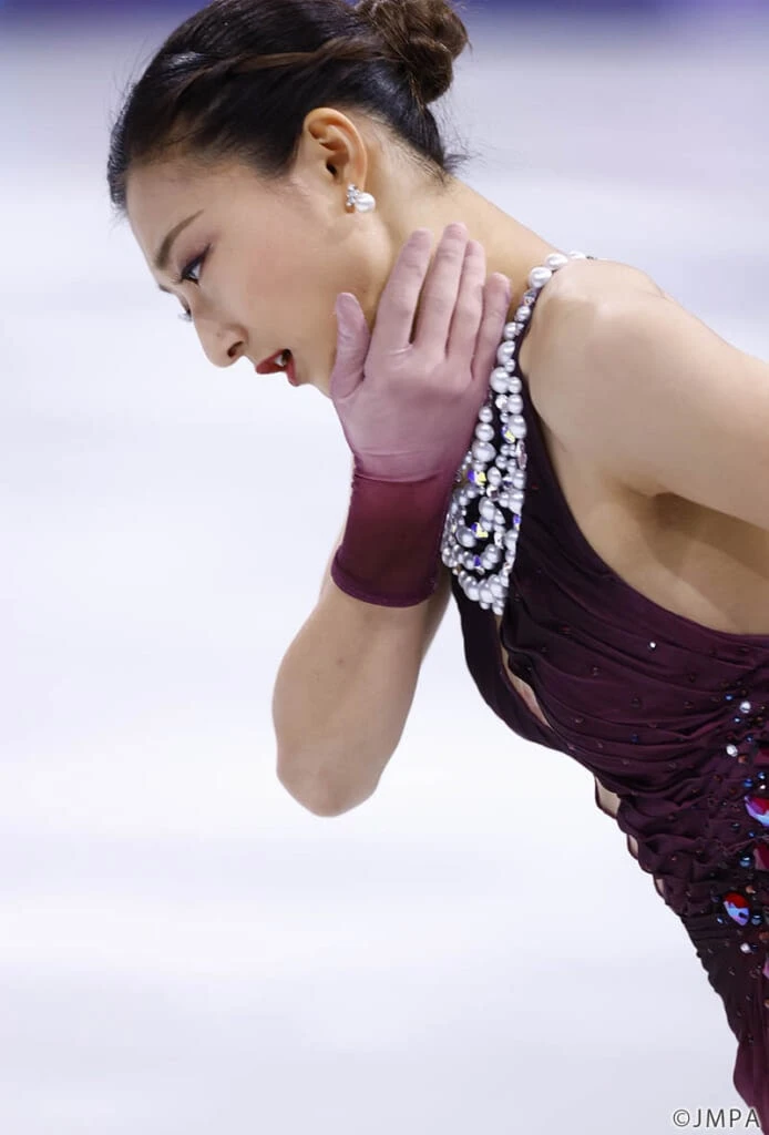 坂本花織。ミラノ五輪フィギュア団体戦フリー演技中の表情