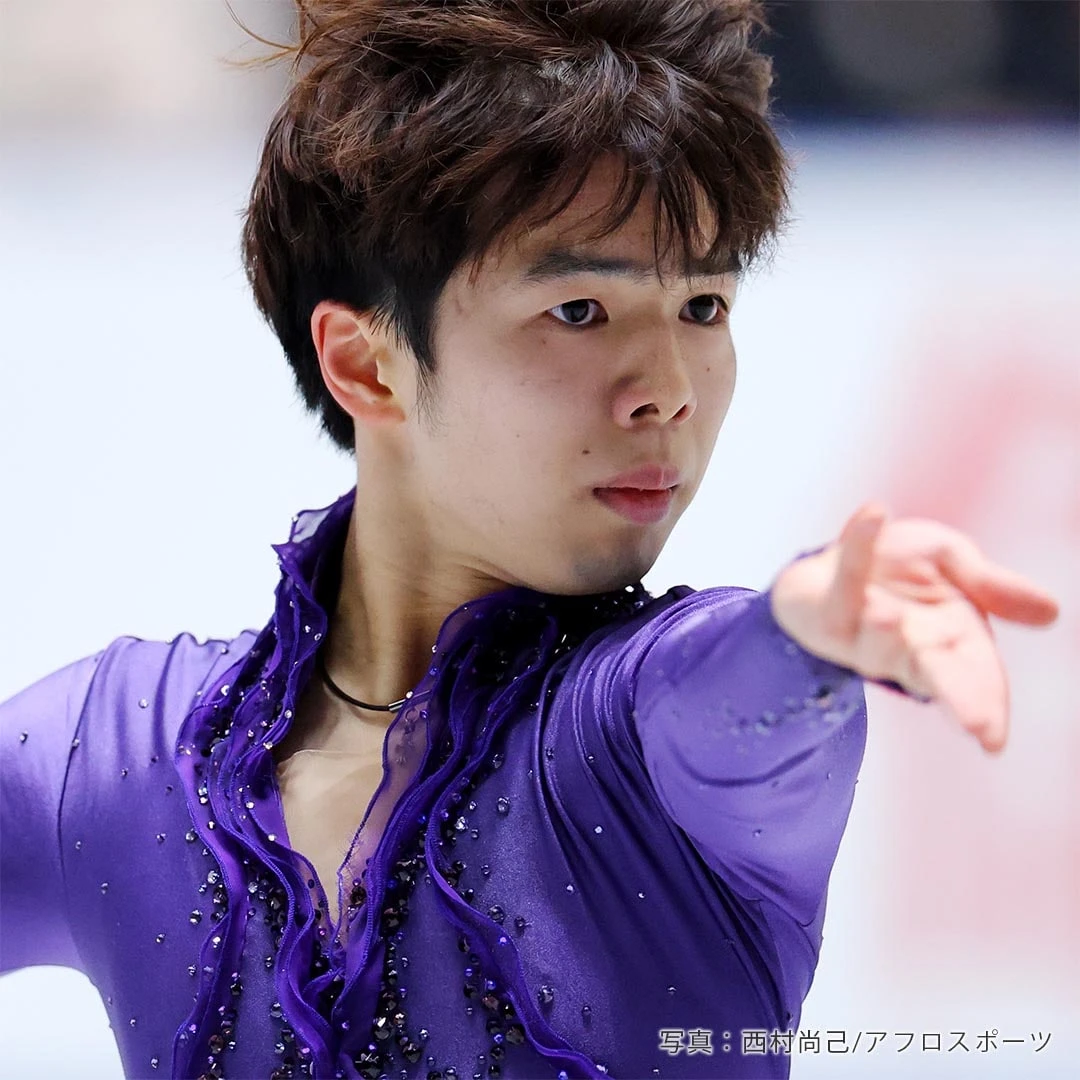 フィギュア団体戦に出場する佐藤駿選手:ミラノ・コルティナオリンピック男子シングル代表。ショートプログラムの紫の衣装をまとって滑る姿。
